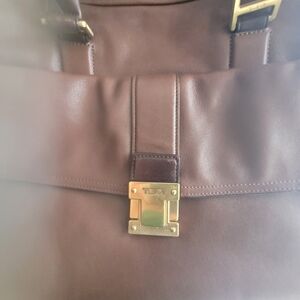 Tumi Brown Leather Bag with Gold Accents